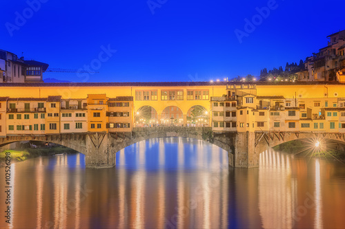 View of medieval stone bridge Ponte Vecchio and the Arno River, Florence