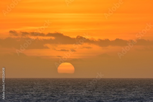 View on scenic orange sunset at sea