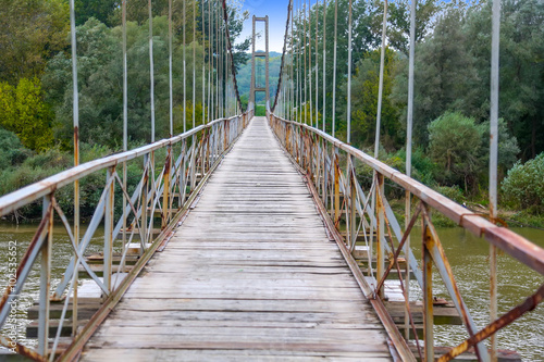 Fototapeta Naklejka Na Ścianę i Meble -  Old wooden suspension bridge