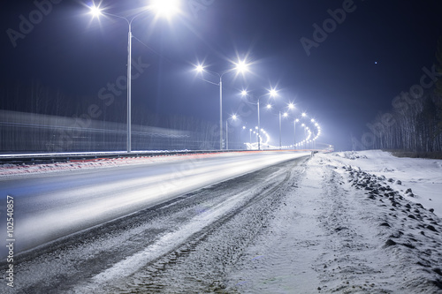 winter highway at night © Yuri Bizgaimer