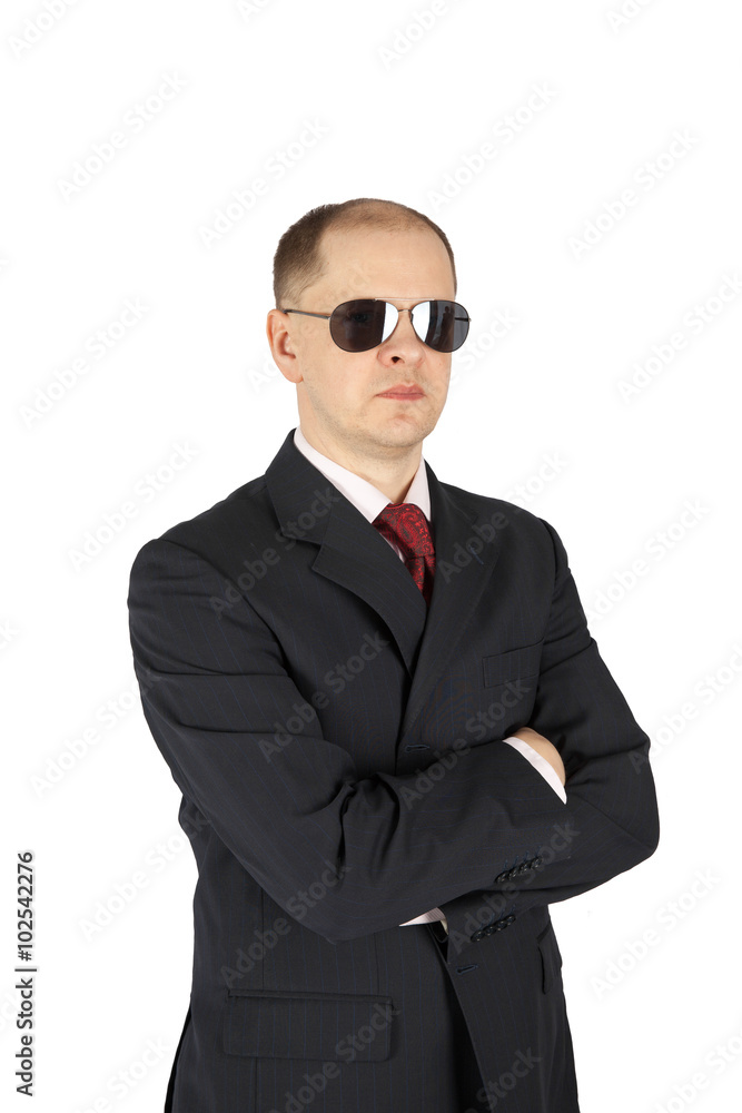 Security guard wearing a suit and sunglasses isolated on white background Security guard wearing a suit and sunglasses isolated on white background