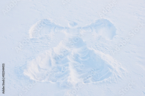 print of angel on the snow surface