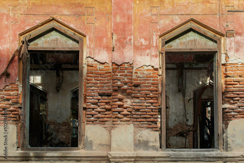 Old abandoned house   Windows of old abandoned house.