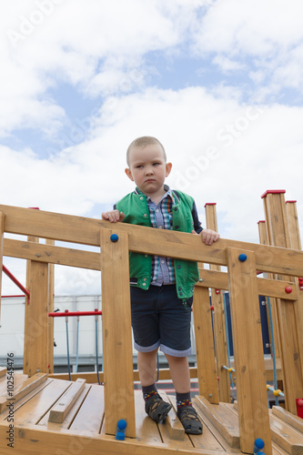 the boy on a ladder