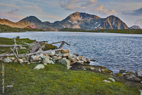 Sunset Panorama of Tevno Lake and Kamenitsa peak, Pirin mountain, Bulgaria