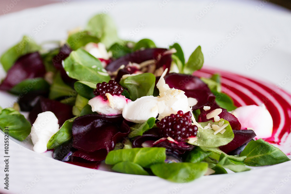 Salad of beets, lettuce and cheese