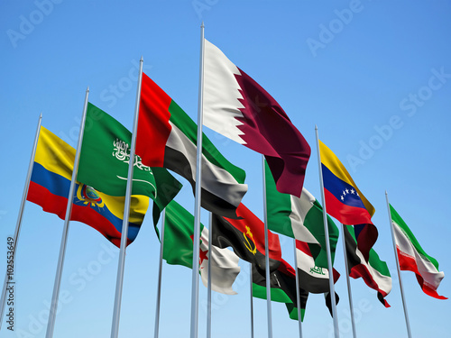 THE OPEC COUNTRIES, flags waving in the wind with a blue sky background. 3d illustration