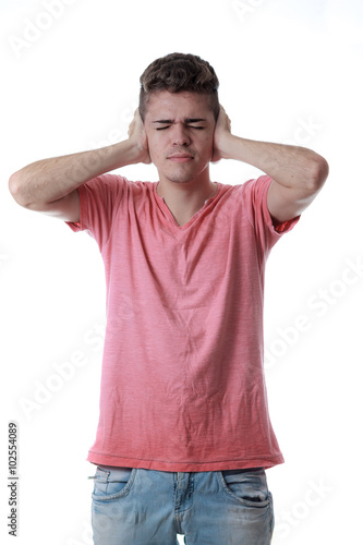 Man covering his ears with his hands