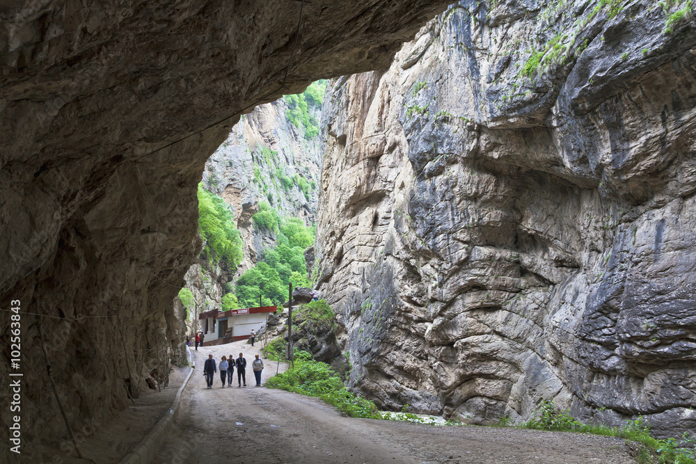 Under overhanging cliffs in narrow Chegemsky gorge.The North Caucasus.