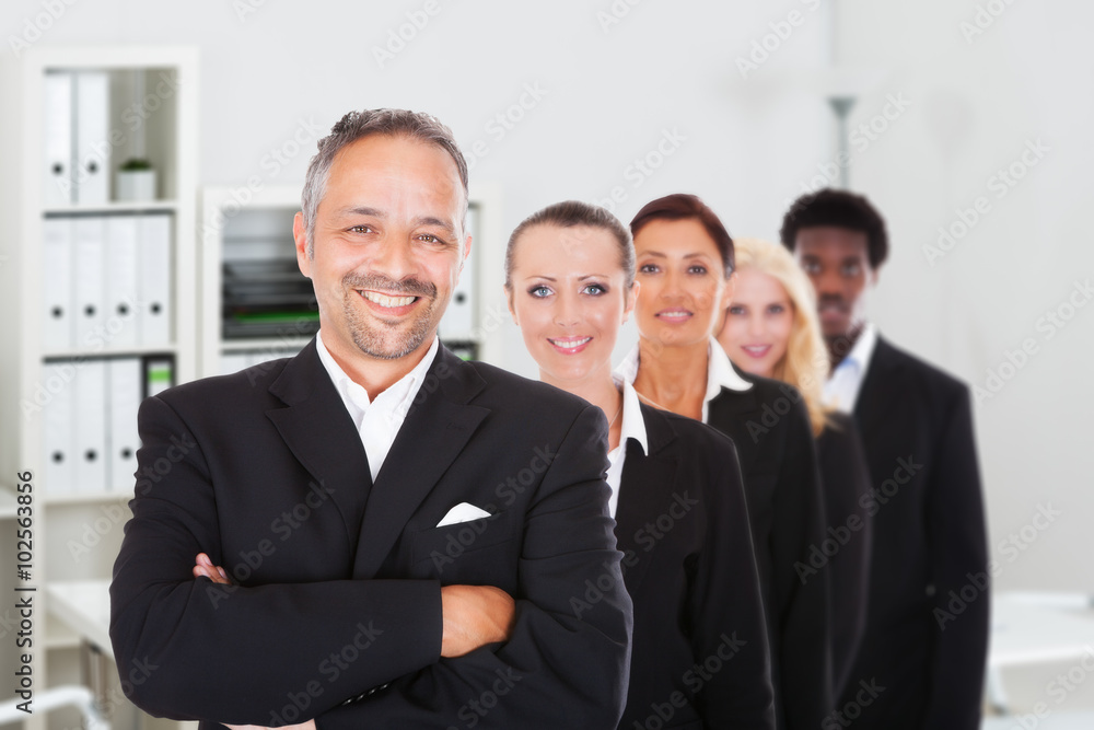 Confident Business People Standing In Row Confident Business People Standing In Row