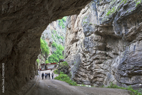 Under overhanging cliffs in narrow Chegemsky gorge.The North Caucasus.