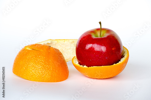 Apple inside an orange