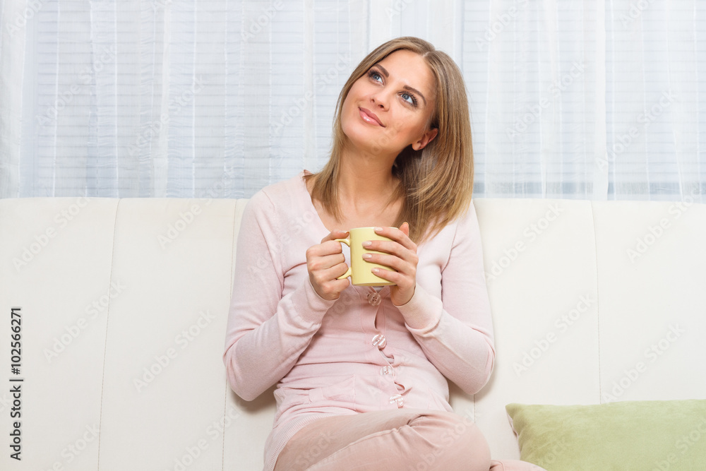 Day dreaming with cup of coffee or tea Day dreaming with cup of coffee or tea