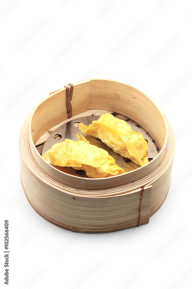shrimp dumpling in bamboo basket isolated on white shrimp dumpling in bamboo basket isolated on white