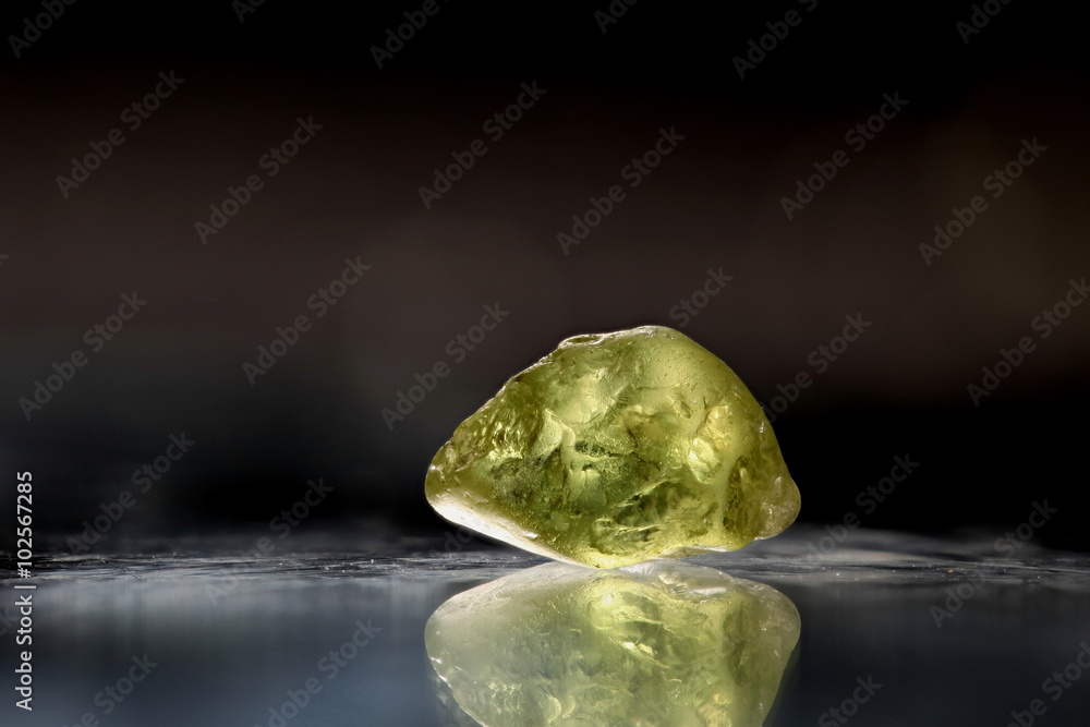 Olivine crystal from Lanzarore, Canary Islands. Lanzarote is famous for gem  olivine and there is a very long tradition for olivine jewelry in  Lanzarote. Stock Photo | Adobe Stock