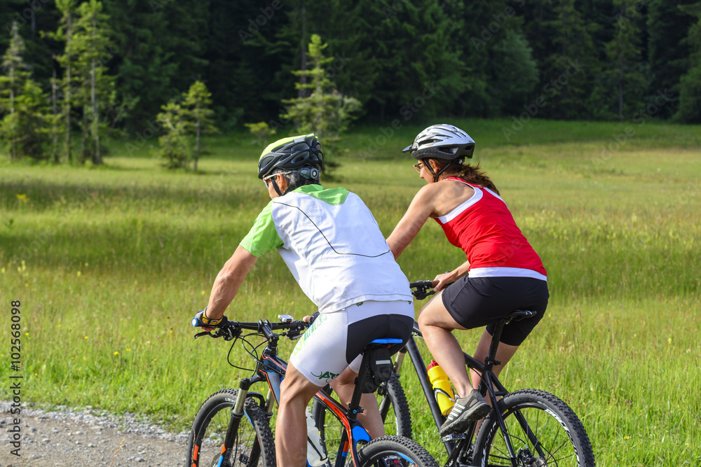 Couple doing cycling tour Couple doing cycling tour