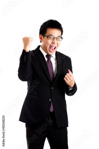 excited businessman celebrating isolated on white