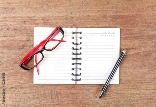 Blank open notebook with glasses, Business template mock up for