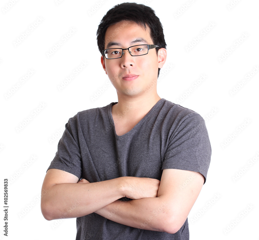 Asian man look at camera with arms crossed isolated on white Asian man look at camera with arms crossed isolated on white