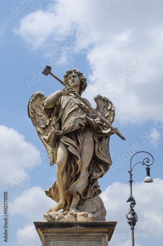 marble statue of angel from the Sant'Angelo Bridge in Rome, Italy