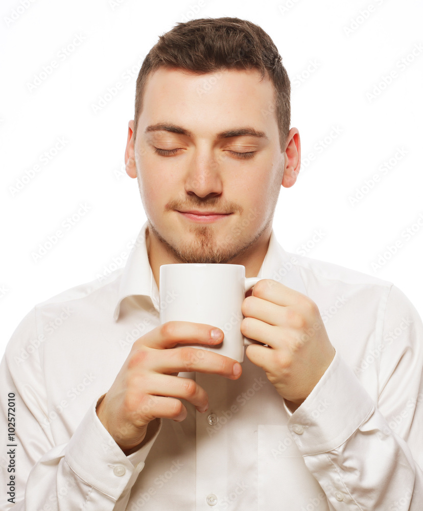 man holding white cup with coffee man holding white cup with coffee