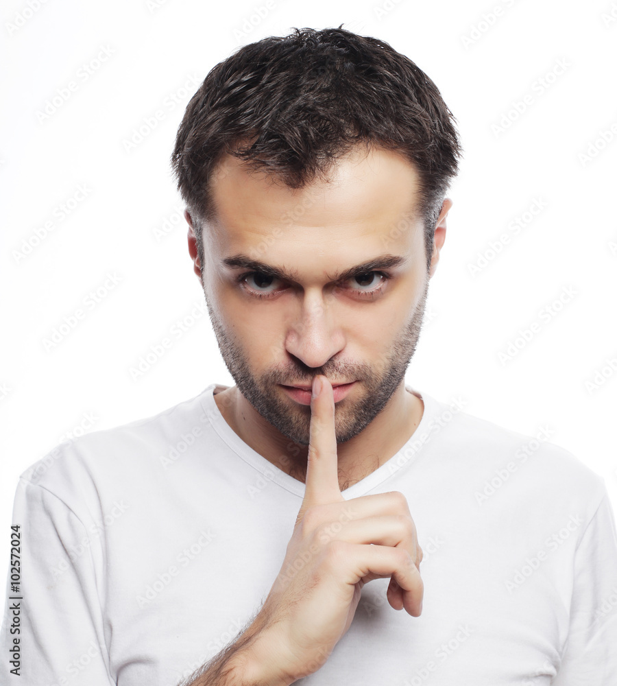 young man making silence gesture, shhhhh!! young man making silence gesture, shhhhh!!