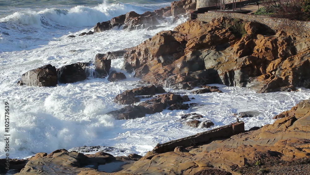 Strong and Furious Waves of the Stormy Sea Crashing on the Cliff, after the Storm. Strong and Furious Waves of the Stormy Sea Crashing on the Cliff, after the Storm.