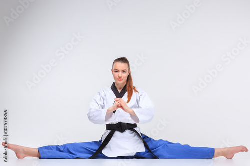The karate girl with black belt 