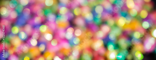 blured bokeh from colorful star paper background