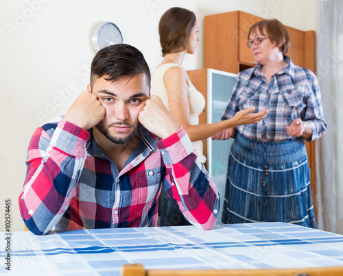Fotografie Adults children dispute  with elderly mother