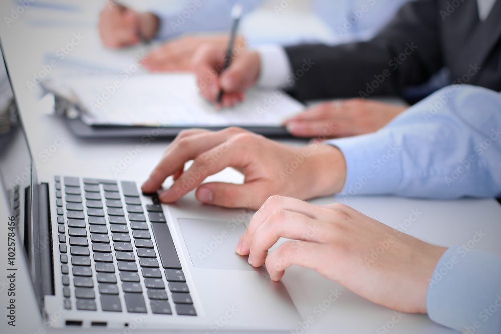 Group of business people working together in office Group of business people working together in office