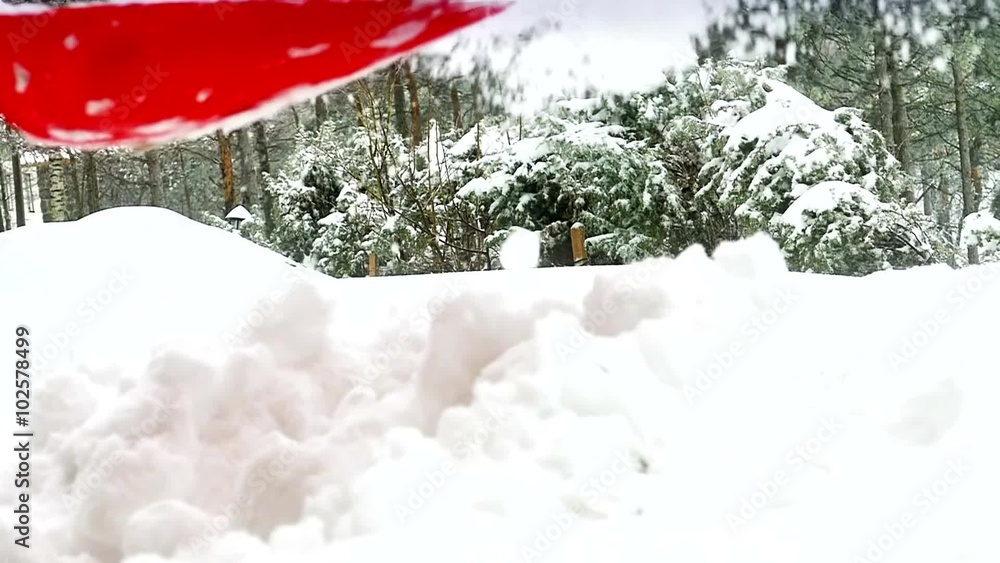 Cleaning snow with red shovel in slow motion in close up, Slow Motion Video Clip Cleaning snow with red shovel in slow motion in close up, Slow Motion Video Clip