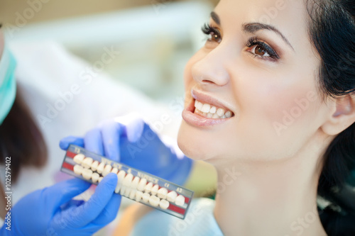 doctor and patient in dentist office 