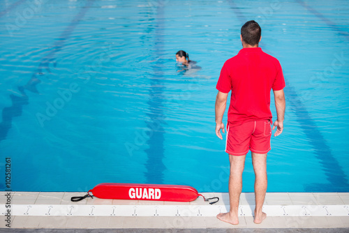 Fotografie Poolside lifeguard