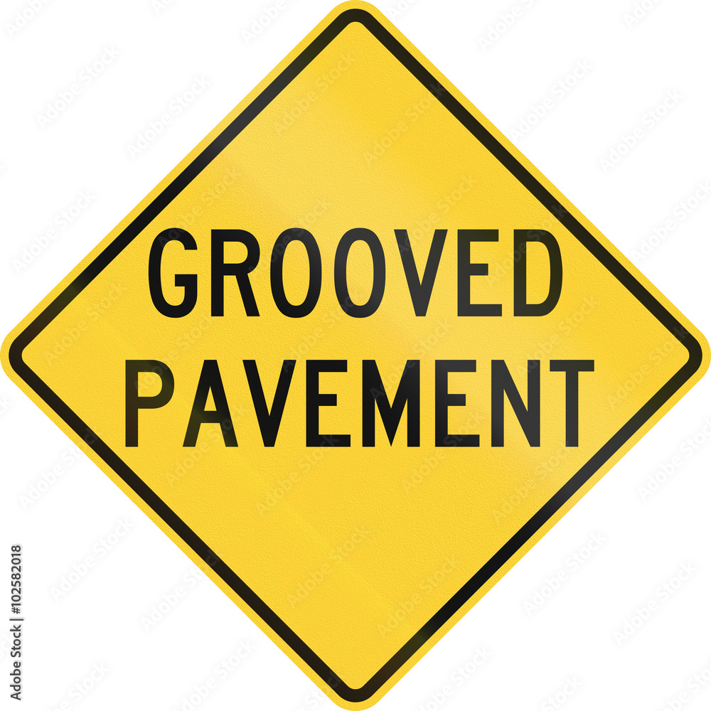 United States MUTCD road sign - Grooved pavement United States MUTCD road sign - Grooved pavement