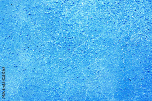 Piece of blue wall with plaster as a background