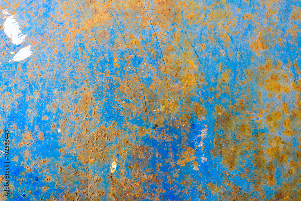 Piece of blue metal background with scratches