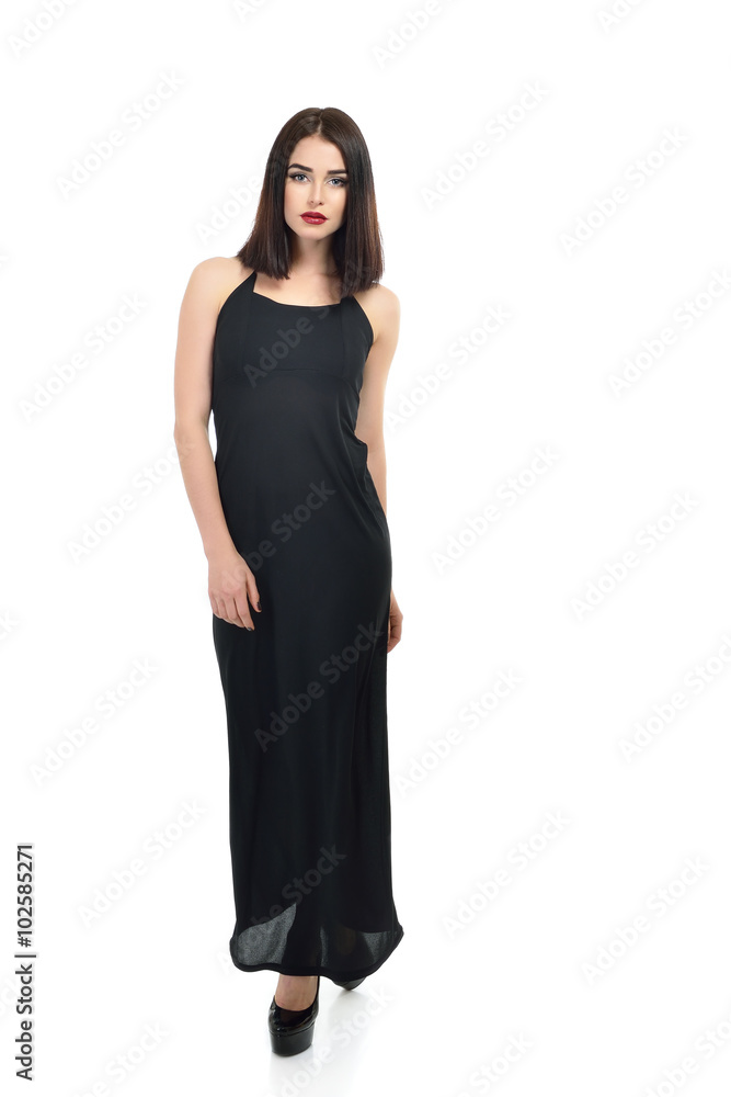 Full-length portrait of young fashion woman in black dress isola Full-length portrait of young fashion woman in black dress isola