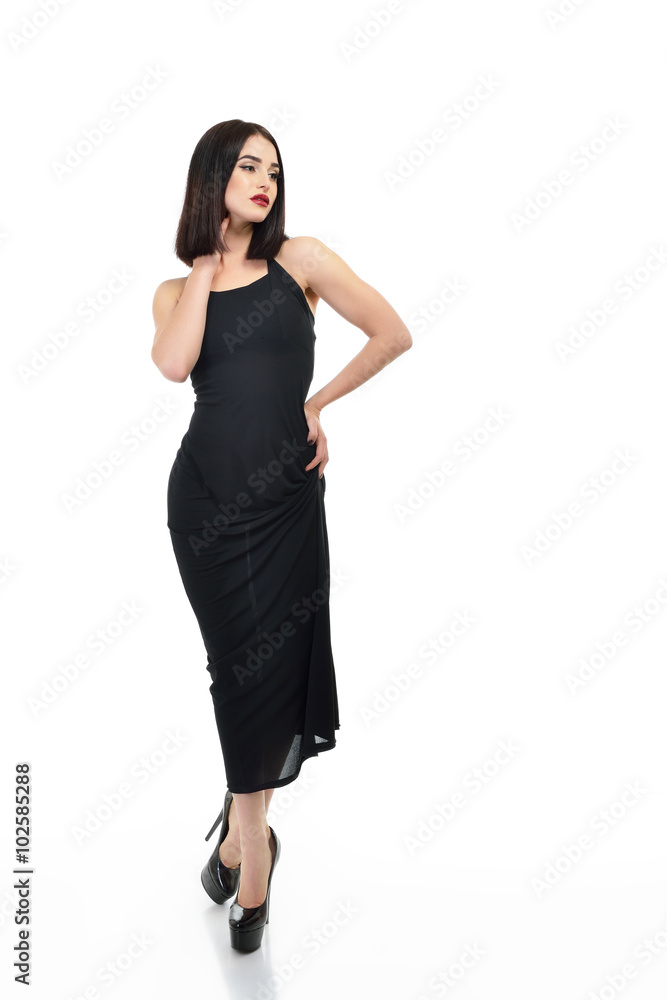 Full-length portrait of young fashion woman in black dress isola Full-length portrait of young fashion woman in black dress isola