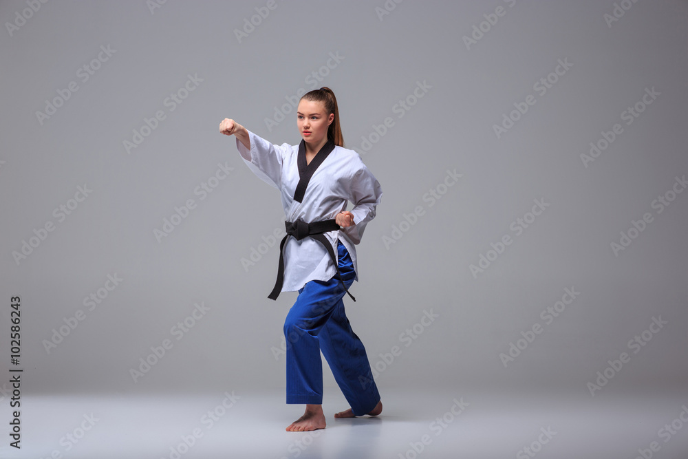 The karate girl with black belt The karate girl with black belt