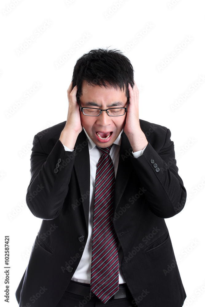Crazy Asian businessman closing ear and scream, isolated on white Crazy Asian businessman closing ear and scream, isolated on white