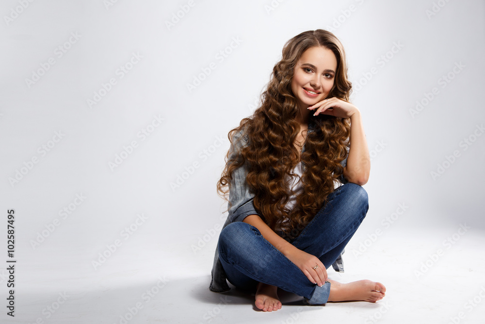 Close-up portrait of beautiful young woman with gorgeous hair and natural  makeup wearing casual clothes. Fashion beauty photo, casual jeans style  Stock Photo | Adobe Stock