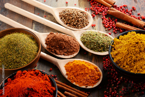 Fototapeta Naklejka Na Ścianę i Meble -  Variety of spices on kitchen table