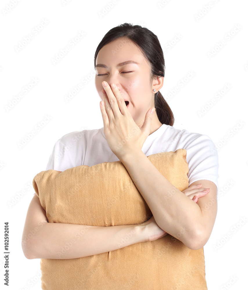 woman yawn and hug pillow isolated on white woman yawn and hug pillow isolated on white