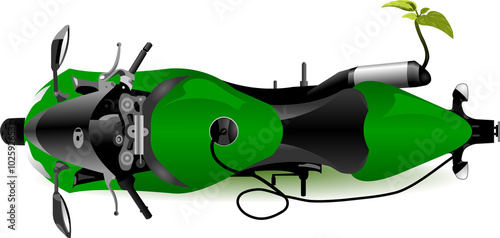 Plant growing from electric motorcycle exhaust pipe 
