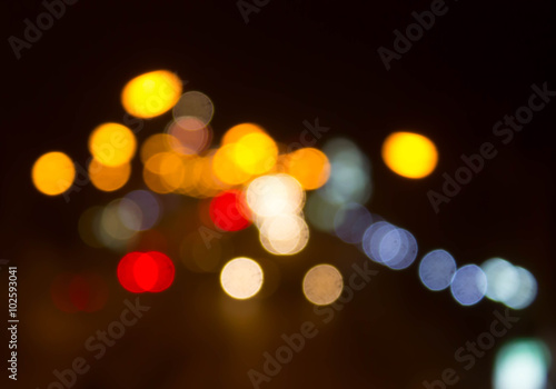 blur Night traffic road with bokeh light abstract background © AnirutKhattirat