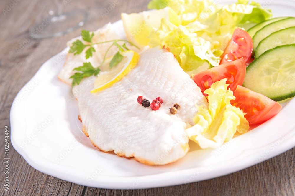 fish fillet and salad fish fillet and salad