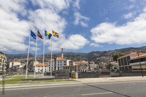 FUNCHAL, MADEIRA - NOVEMBER 12: A collection of flags on the Fun
