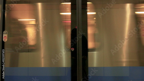 TAIPEI,  TAIWAN - FEBRUARY 9, 2016: Taipei MRT coach full of passengers about to stop at Dongmen MRT Station