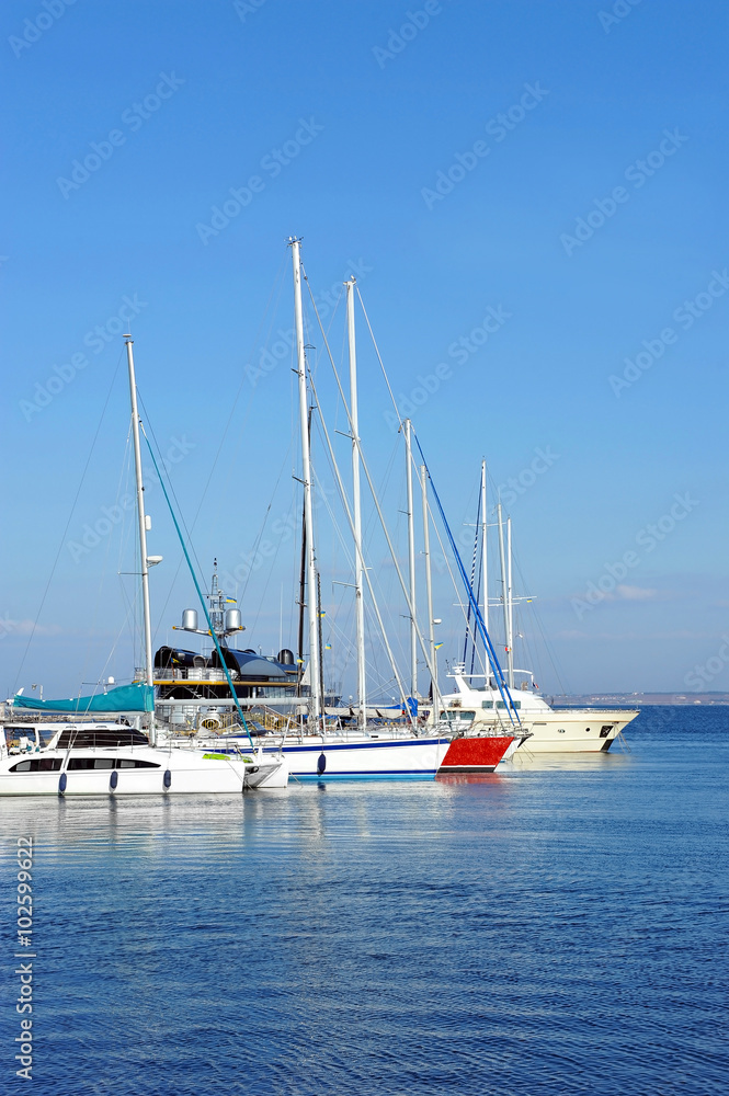 Motor yacht over harbor pier, Odessa, Ukraine
